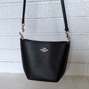 Coach Black Crossbody Bag with Adjustable Strap and Silver Hardware